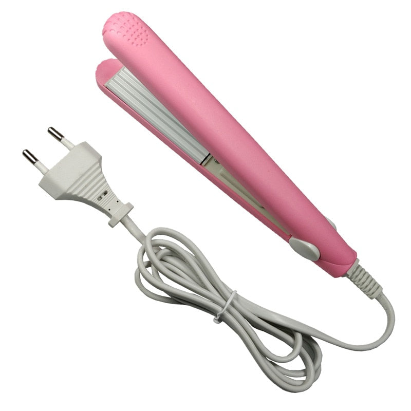 A mini hair iron pink corrugated plate electric curling iron curl modelling tools